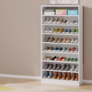 White shoe rack filled with various sneakers and storage boxes