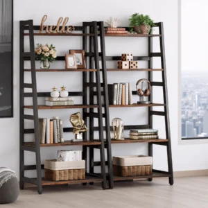 Two tall ladder-style bookshelves with rustic wood shelves and black frames